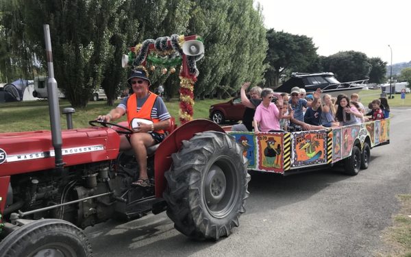 Harry Osborne driving the fun tractor at Tahuna Beach Holiday Park